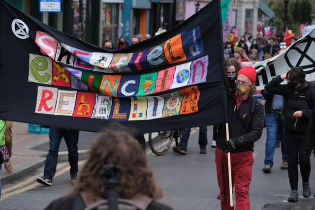An Extinction Rebellion banner on the May Day March and Kill The Bill protest held in Sheffield