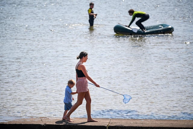 Crowds hit the beach as temperatures soar across the country