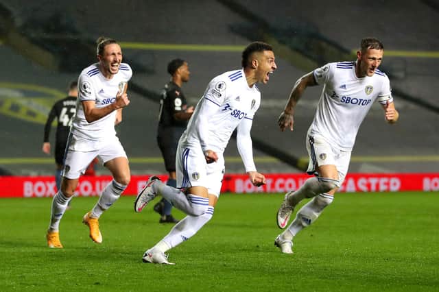 LEEDS, ENGLAND - OCTOBER 03: Rodrigo Moreno of Leeds United celebrates after scoring his team's first goal during the Premier League match between Leeds United and Manchester City at Elland Road on October 03, 2020 in Leeds, England. Sporting stadiums around the UK remain under strict restrictions due to the Coronavirus Pandemic as Government social distancing laws prohibit fans inside venues resulting in games being played behind closed doors. (Photo by Catherine Ivill/Getty Images)