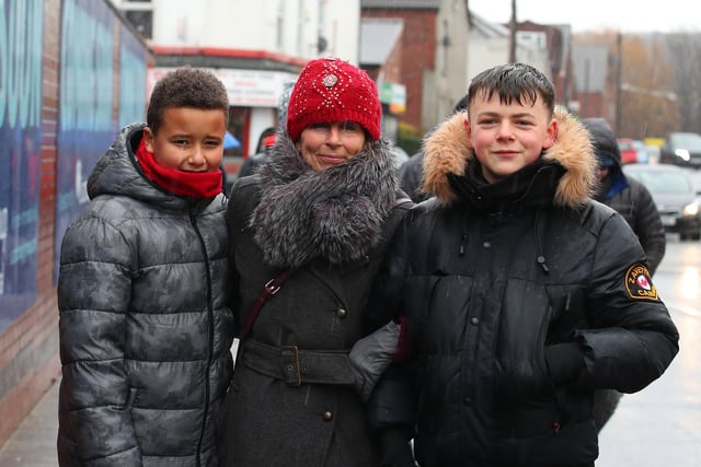 These Sheffield United fans are well wrapped up outside a wet and windy Bramall Lane ahead of the Blades' match against Swansea City