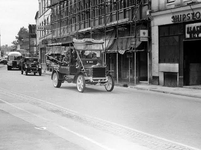 This was taken in 1970, with old buses being paraded through the market place