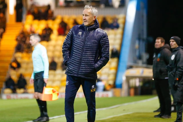 Carlisle United manager Keith Millen watches on as Stags lead.