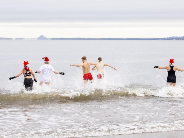 The festive tradition takes place every year in Portobello, Edinburgh, on Christmas morning.