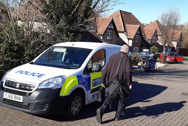 A police scientific support officer arrives at the suspected murder scene at Edenthorpe Dell, Owlthorpe, Sheffield, today
