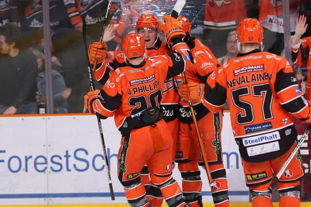 Alex Graham, pictured celebrating scoring against the Cardiff Devils. Picture: Hayley Roberts