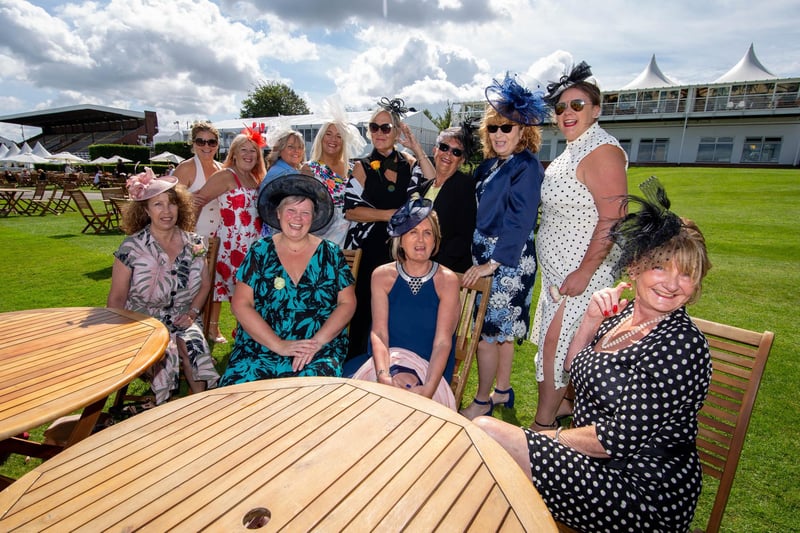 Ladies Day at Qatar Goodwood Festival, Goodwood on 29th July 2021
Pictured:  Friends enjoying a day out at Goodwood
Picture: Habibur Rahman