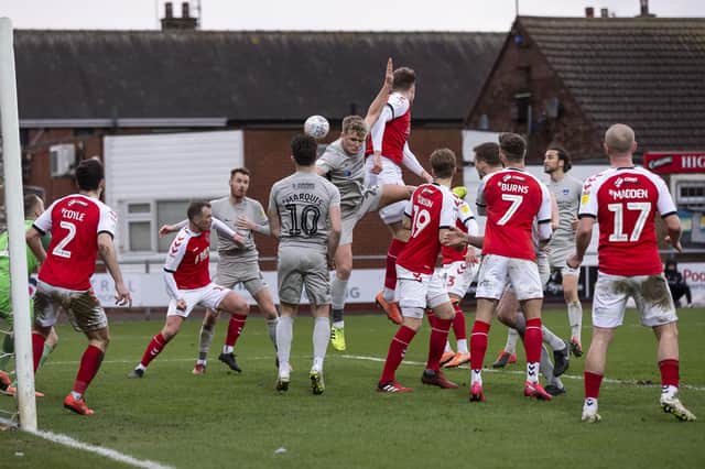 Cameron McGeehan of Portsmouth competes for a cross during the Sky Bet League One match between Fleetwood Town and Portsmouth at Highbury Stadium on February 22nd 2020 in Fleetwood, England. (Photo by Daniel Chesterton/phcimages.com)