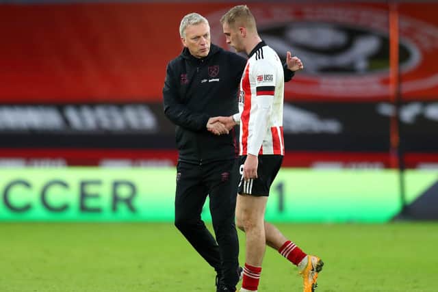 West Ham United manager David Moyes (left) Sheffield United's Oliver McBurnie shake hands after the final whistle during the Premier League match at Bramall Lane, Sheffield.  Cath Ivill/PA Wire.