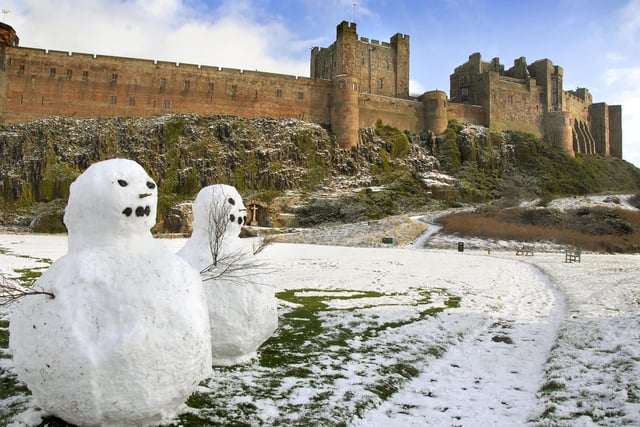 Snowmen at Bamburgh Castle.