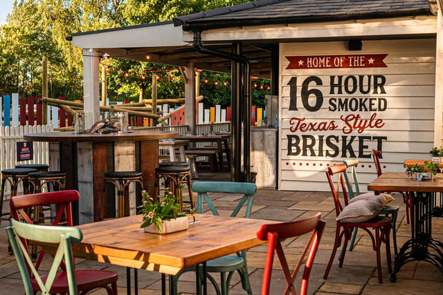 The smokehouse's huge outside area is perfect for chilling in all seasons - with heated lamps and a large play area for kids.