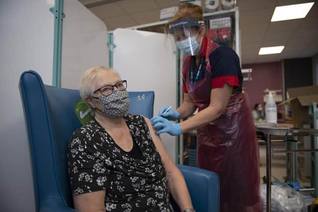 Patient Trixie Walker at the Northern General Hospital, Sheffield receiving their first COVID Pfizer vaccine doses yesterday (Tuesday, December 8). Pooled picture by Daily Mirror/Andy Stenning.