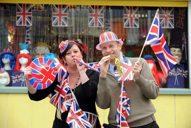 Staff from U Need Us, Tracey Knipe and Steve Searle get the street party started outside their store in 2011