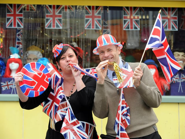 Staff from U Need Us, Tracey Knipe and Steve Searle get the street party started outside their store in 2011