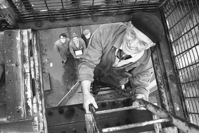 Richard Tunstall climbs into his crane for the last time at the Deptford yard of Sunderland Shipbuilders Ltd.
