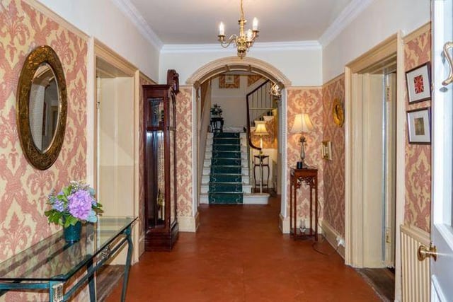 The hallway is spacious and traditionally decorated