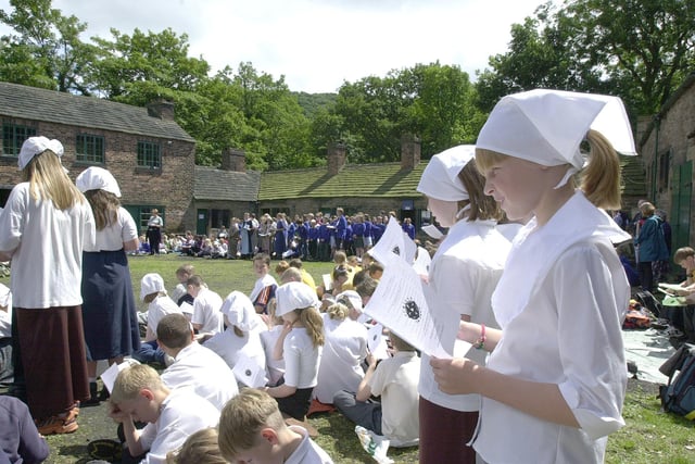 South Yorks Church schools put on a Millennium event at the Abbeydale Industrial Hamle and pupils from  The Ellis school and Hemmingfield, sing their hymns