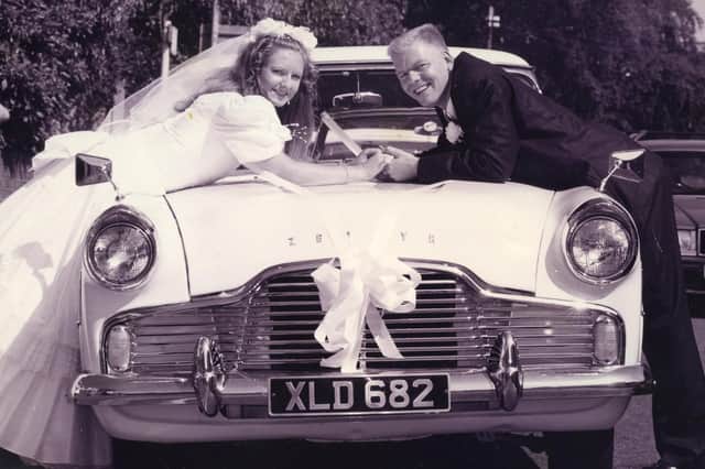 Rhondsa Sealey and Paul Kneller prepare to drive away from their wedding at Fareham registry office in their beloved Zypher, 1995. The News PP5396