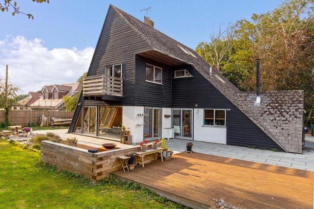 And so to the final property in Rightmove's top five - this extraordinary Scandinavian-style home in the seaside resort of Littlehampton, west Sussex, which came on the market for £765,000. It is one of only three in the UK designed by Italian architect Antonia Parella, and all of its rooms, including the five bedrooms, have their own individual shape.