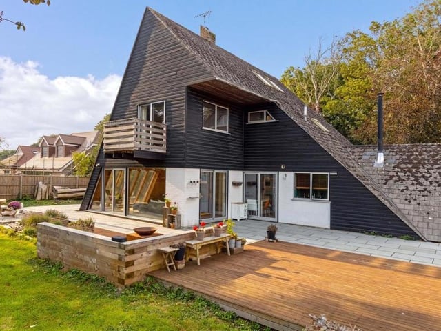 And so to the final property in Rightmove's top five - this extraordinary Scandinavian-style home in the seaside resort of Littlehampton, west Sussex, which came on the market for £765,000. It is one of only three in the UK designed by Italian architect Antonia Parella, and all of its rooms, including the five bedrooms, have their own individual shape.