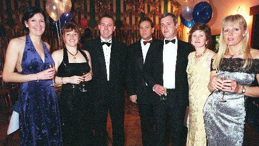 Joanne White, Julie Payne, Andy Payne, Stafford Roland, Nick Cooke, Ruth Cooke and Johanna Roland at the Baldwins Omega Millenium Theme Night
