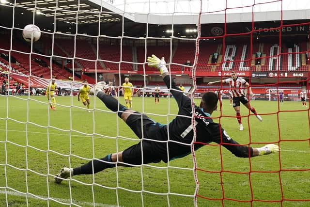 Billy Sharp of Sheffield Utd scores from the penalty spot during the Premier League match at Bramall Lane, Sheffield.  Andrew Yates/Sportimage