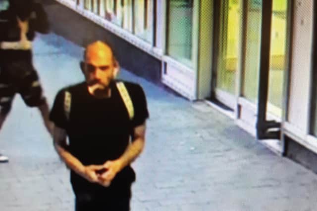 Police have released CCTV footage of a man they want to speak to in connection with the assault of an elderly man in Sheffield city centre.