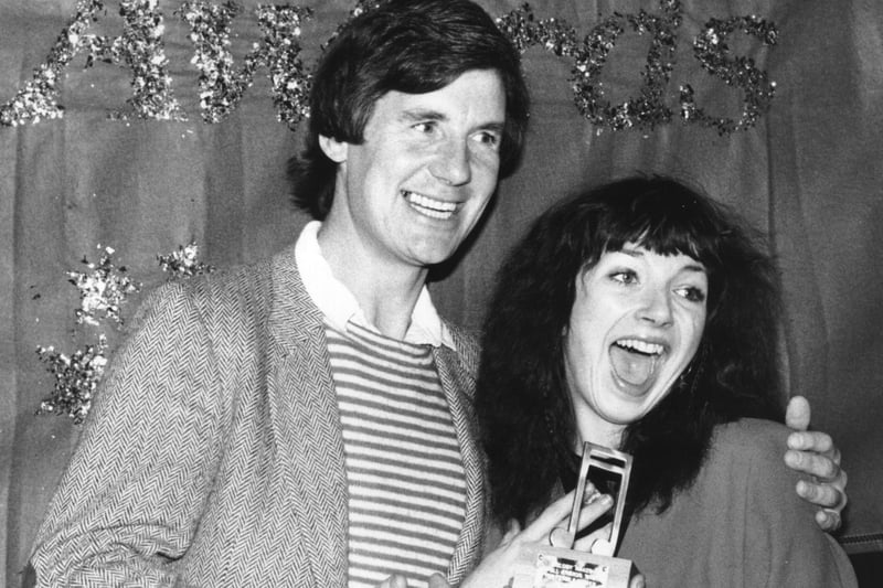 Monty Python star, TV globetrotter, actor and director Michael Palin presents music magazine Melody Maker's Top Girl Singer award(!) to Kate Bush in November 1979