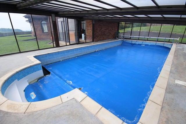The indoor/outdoor swimming pool with retractable roof.