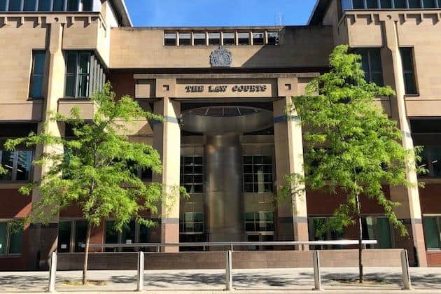 Sheffield Crown Court, pictured, has heard how a teenager has denied murdering two revellers after they suffered fatal stab wounds during a fracas in Doncaster town centre.