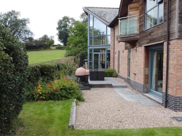 Just nipping outside again to show where those French doors from the family area lead. This photo also underlines the very individual design of the house.