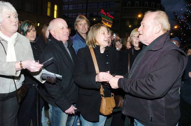Joe Cocker with fans at Sheffield Town Hall to unveil his Legends plaque, on December 15, 2007