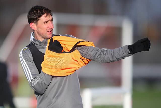 Chris Basham collects the fines following Sheffield United's games at their training ground: Simon Bellis/Sportimage