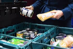 File photo dated 17/01/18 of goods at a food bank. The need for food banks increases in areas where Universal Credit has been in operation the longest, new research suggests.