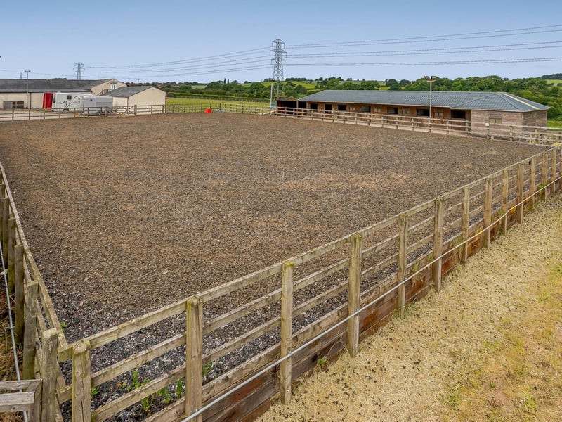 The impressive manege at Warren Farm Stables. It is a secure, enclosed area for the safe training of horses and riders.