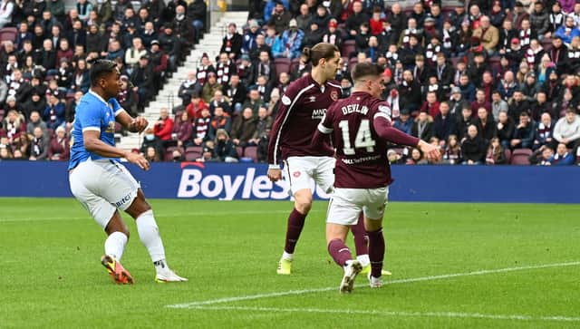 Peter Haring and Cammy Devlin look on as Alfredo Morelos opens the scoring for Rangers. Picture: SNS