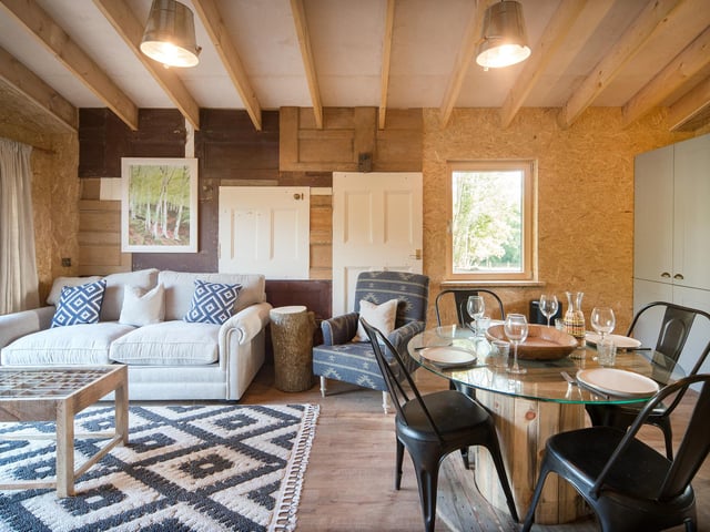 Two of the treehouses are still having some final touches to them, but for the time being you can admire this picture of inside Treecreeper which is furnished with upcycled material including copper pipes and old doors used for cladding.