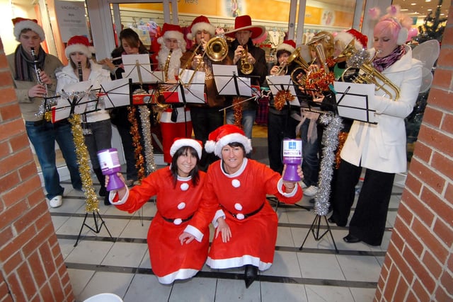 South Tyneside Youth Orchestra is pictured playing Christmas carols outside the Adams store in 2007. Do you recognise anyone in the photo?