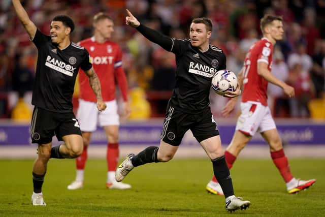 Sheffield United's John Fleck celebrates scoring his sides second goal during the Sky Bet Championship play-off semi-final, second leg match at the City Ground, Nottingham. PA Photo.