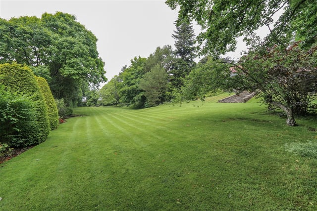 The house has a large lawned area overlooking a 2.4 acre field which is included in the sale.
