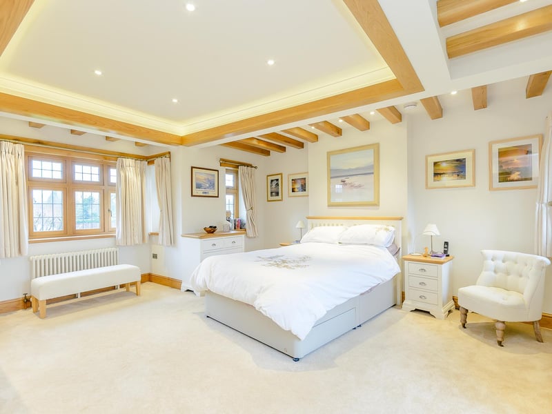 This stunning room is one of four bedrooms at the property