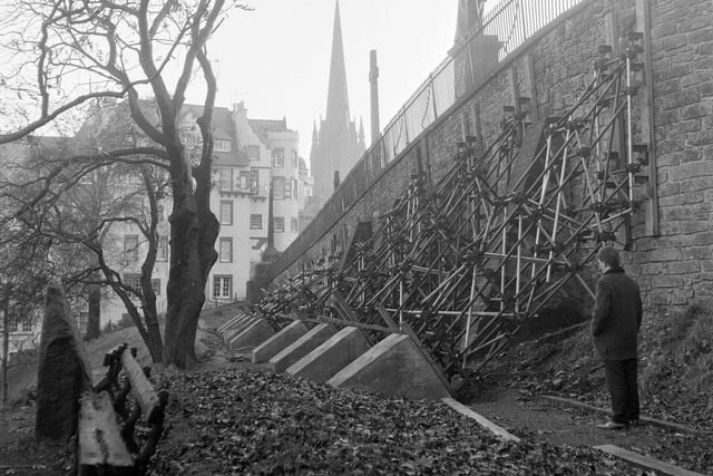 A line of steel buttresses are erected against the North Parapet wall of Edinburgh Castle Esplanade because of subsidence in November 1966