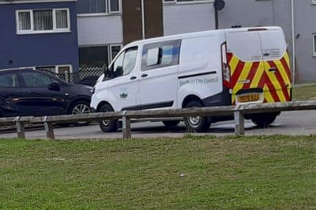 This was the scene at Bowshaw Close, Batemoor, today, as work to bring the street back to normal went ahead after a police murder investigation. A council van is pictured after workmen scubbed the street clean this morning