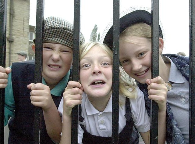 Sally Howard-Saunders (left), Kirsty Hunt and Rosie Ransom at Rivelin Primary School. To celebrate the schools's 100th anniversary the pupils dressed up in Victorian costume prior to a trip to Scarborough on October 3, 2000
