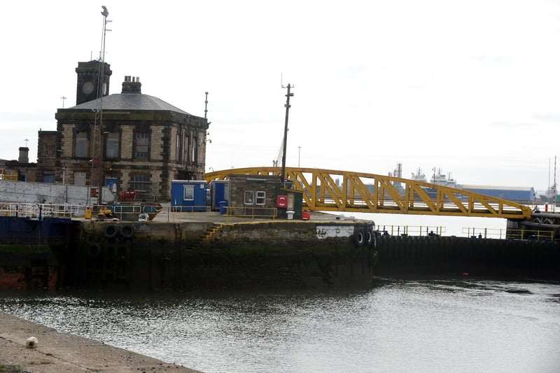 Just before the station, turn left and following the blue sign down the bank from here you'll have excellent views of the Port of Sunderland. Pictured is the Gladstone Swing Bridge.
