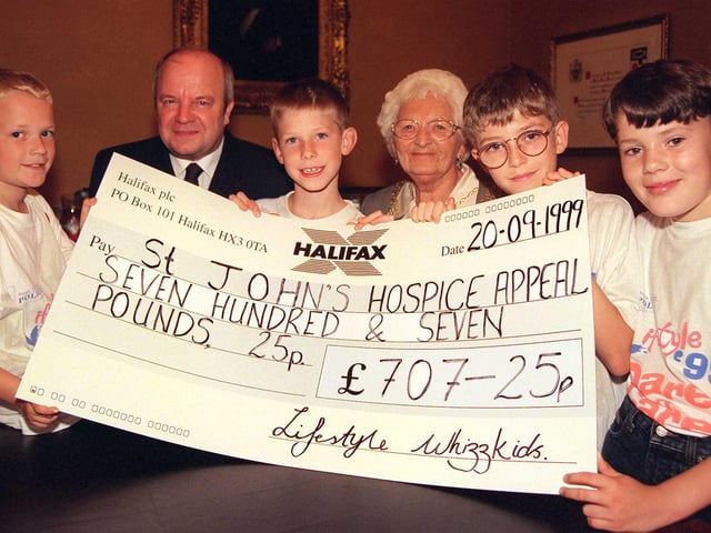 The Whizzkids, raised just over £700 for the St John's Hospice in 1999. Our picture shows the Mayor of Doncaster, Councillor Margaret Robinson and Hospice treasurer Alan Dootson accepting the cheque from the whizz kidders. The fund-raising foursome are, from left, David Mallon, Alex Dickinson, Adam Hewitt and Karl Cooper, all aged ten.
