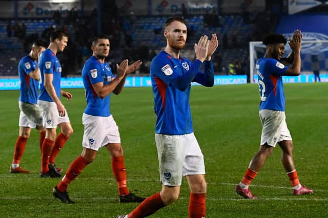 Tom Naylor (4) of Portsmouth applauds the fans at full time after a 2-0 win during the EFL Sky Bet League 1 match between Portsmouth and Wycombe Wanderers at Fratton Park, Portsmouth, England on 26 December 2019.