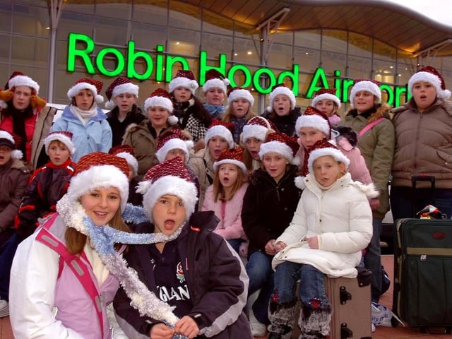 The Adwick Children's Choir who flew from Robin Hood Airport to Prague yesterday (30 Nov), where they performed their songs in front of the City's Mayor. In the foreground are Stephanie Clifton, aged 14, and Joe Craswell, aged nine.