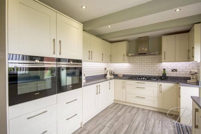 A stunning, modern and stylish fitted kitchen which comes complete with a beautiful range of matching units.
