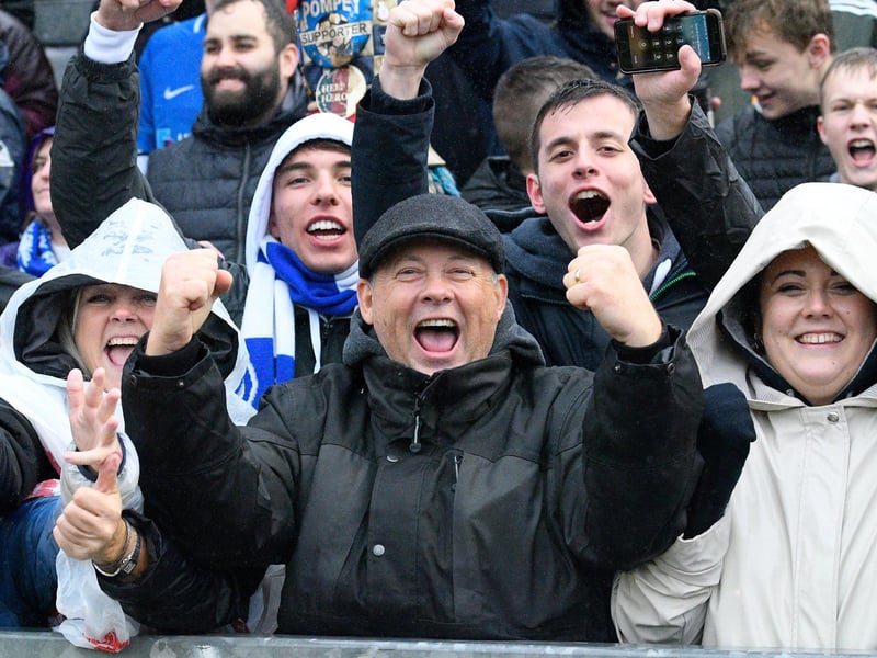 The Fratton faithful in the rain at Bristol Rovers last season.