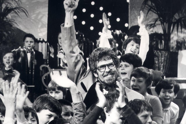 Rolf Harris and children from Hatfield Middle school,at Sheffield Polytechnic, Collegiate Crescent, where Rolf was filming a tv show   March 25th 1981